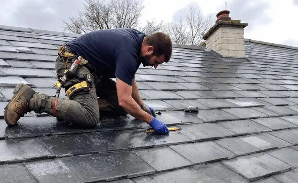 Slate roof repair London emergency callout after storm damage