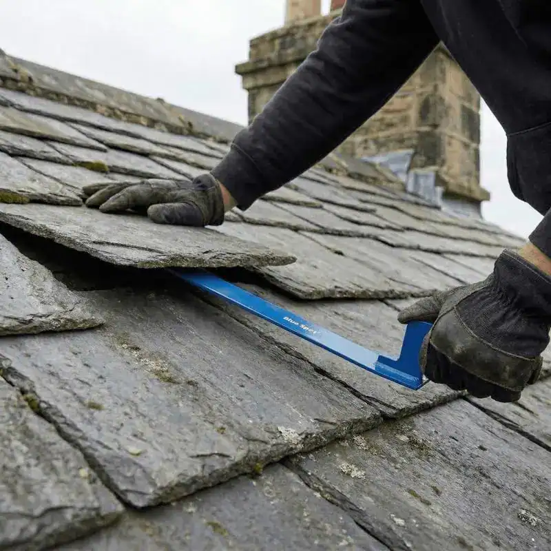 Slate roof repair London roof showing slipped and cracked slates
